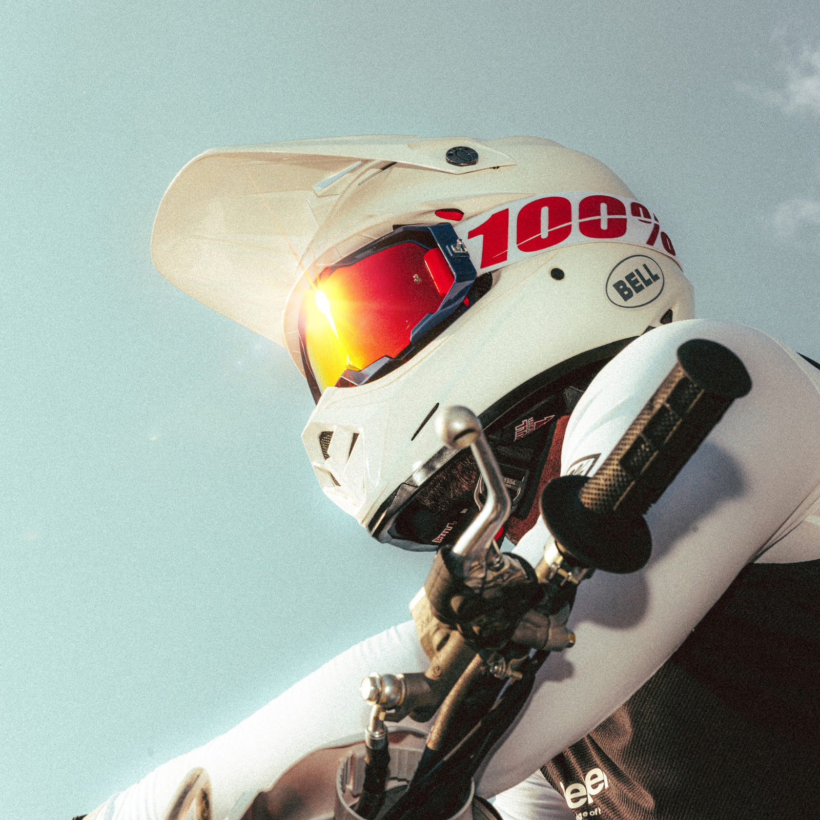 rider in gear wearing 100% ARmatic Goggles