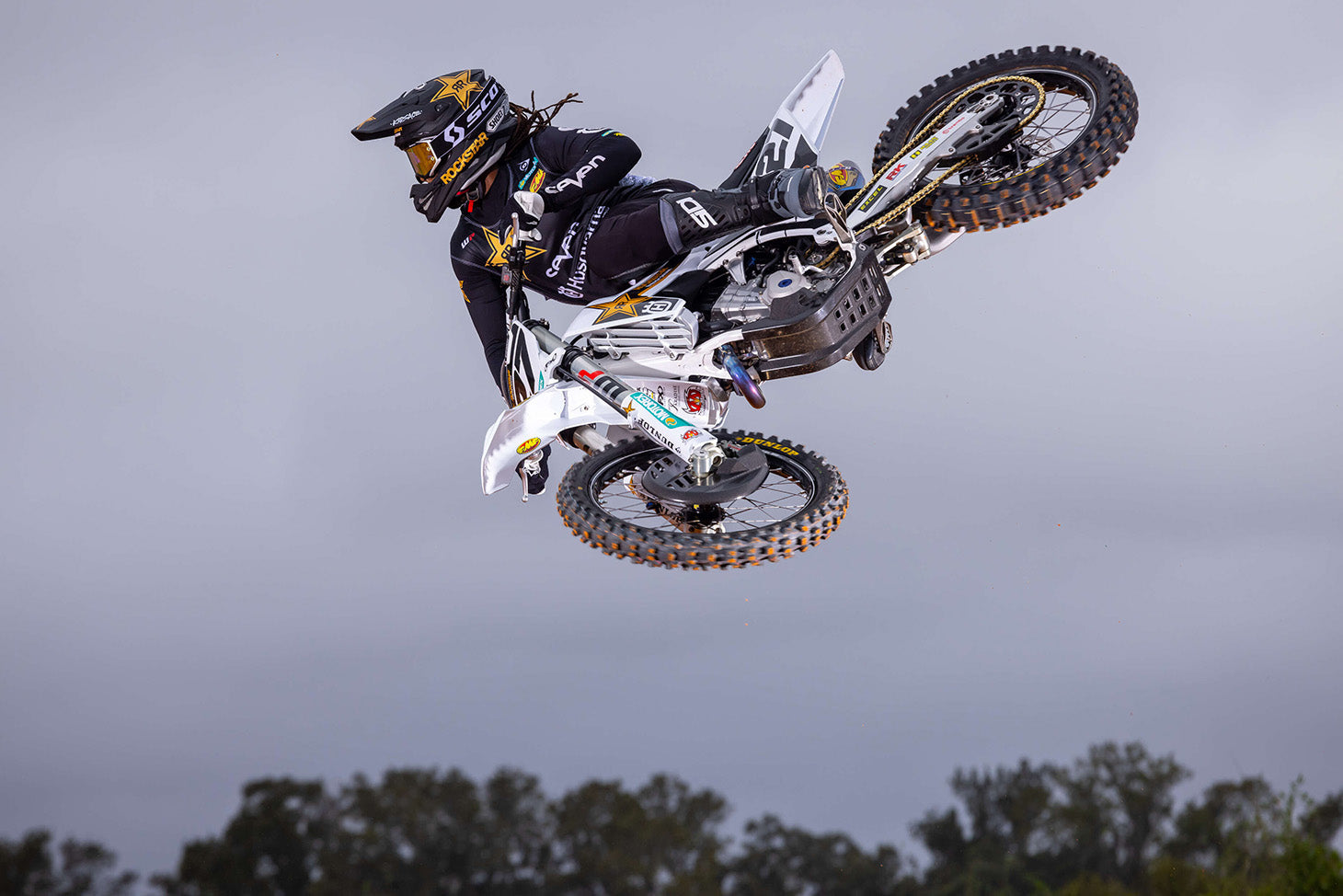 Motocross rider getting air over a jump