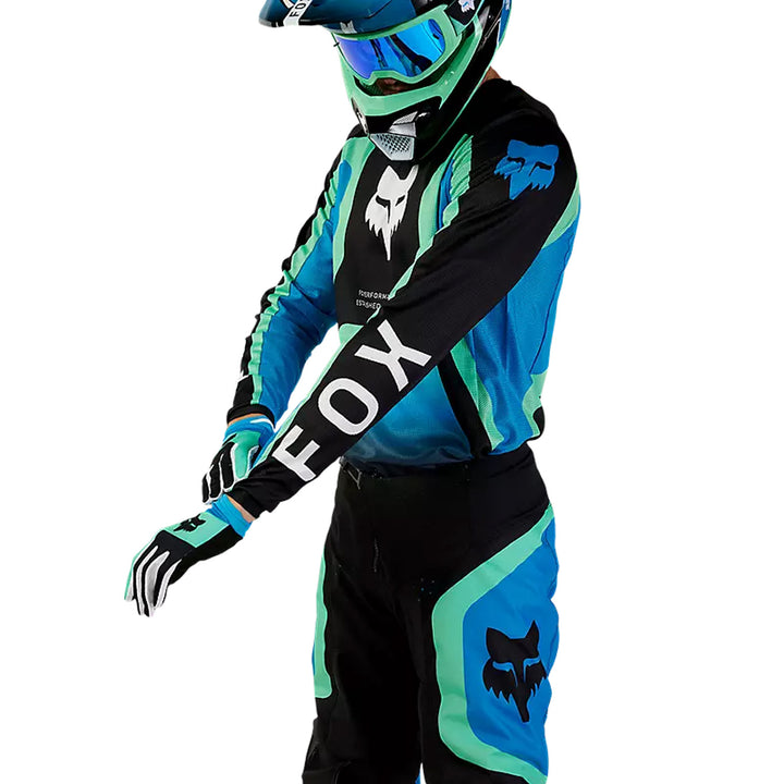 Fox Racing 180 Ballast Jersey Black/Blue - Side View of Model Showing Off Sleeve Graphic