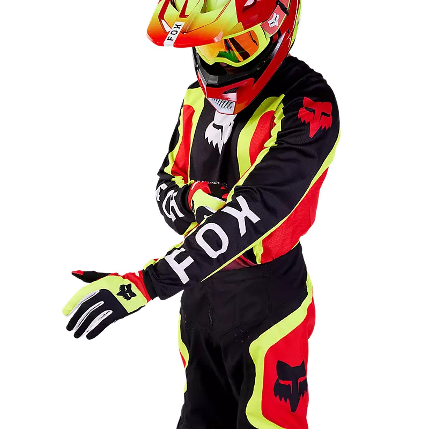 studio photo of dirt rider in red/yellow Fox Racing 180 Ballast Gear