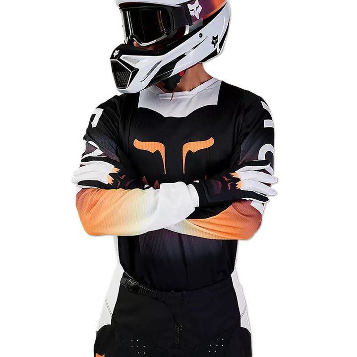 Fox Racing 180 Flora Jersey Black - Front View of Model Posing in Jersey with Arms Crossed
