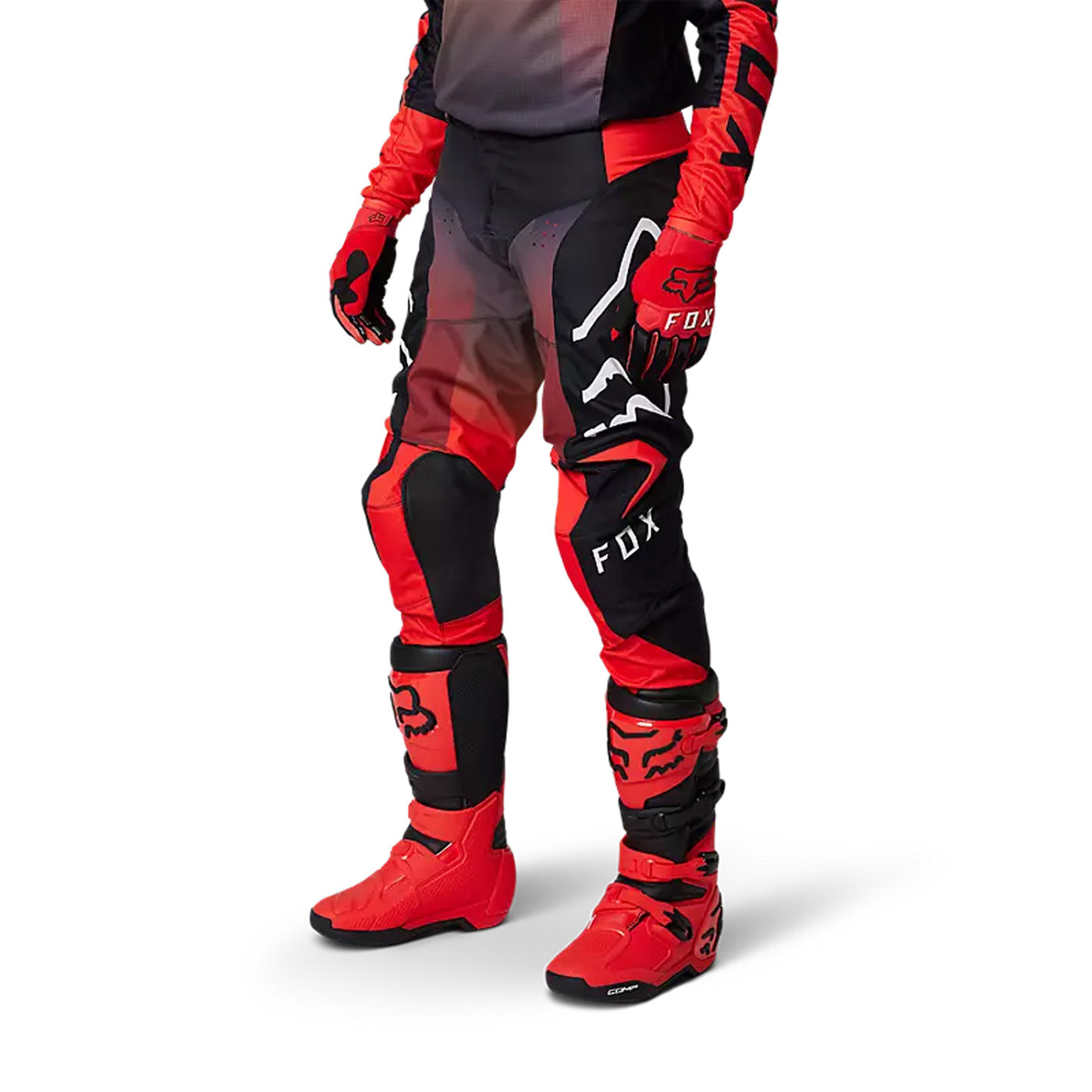 Fox Racing 180 Leed Pants Fluorescent Red - Front Side View of Model Posing in Pants