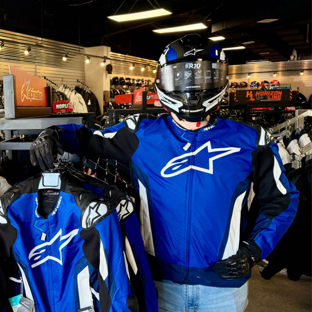 Rider trying on motorcycle gear in Sprocketz before buying