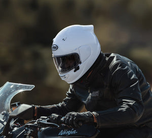 Rider wearing white Arai Contour-X Helmet