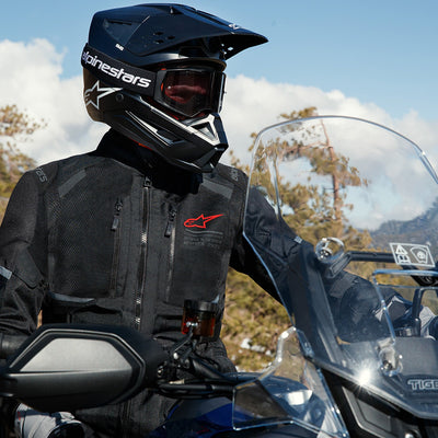 Alpinestars Andes Air Drystar Jacket - Lifestyle of Rider Wearing Jacket Sitting on Dual Sport Bike