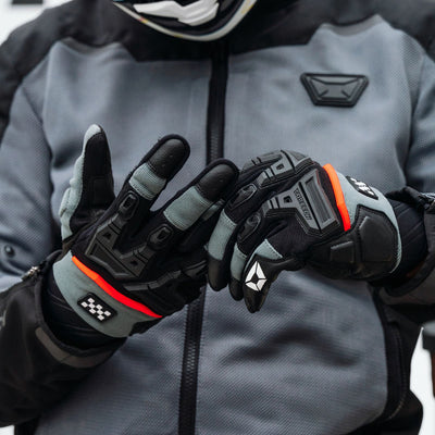 Cortech Men's Aero-Tec 2.0 Gloves Gunmetal - Lifestyle Close-Up of Rider pulling gloves