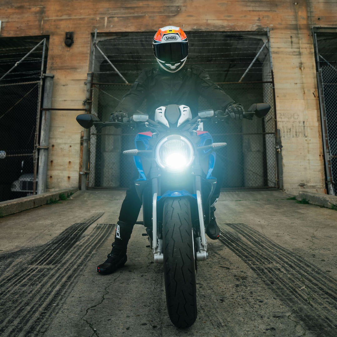 Cortech Men's Hyper-Tec 2.0 Jacket Black/White - Lifestyle head-on shot of rider in jacket on motorcycle with headlight on