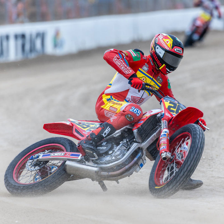 Cortech Lite Gloves Red/Black - Lifestyle shot of rider wearing gloves while sliding on flat track bike
