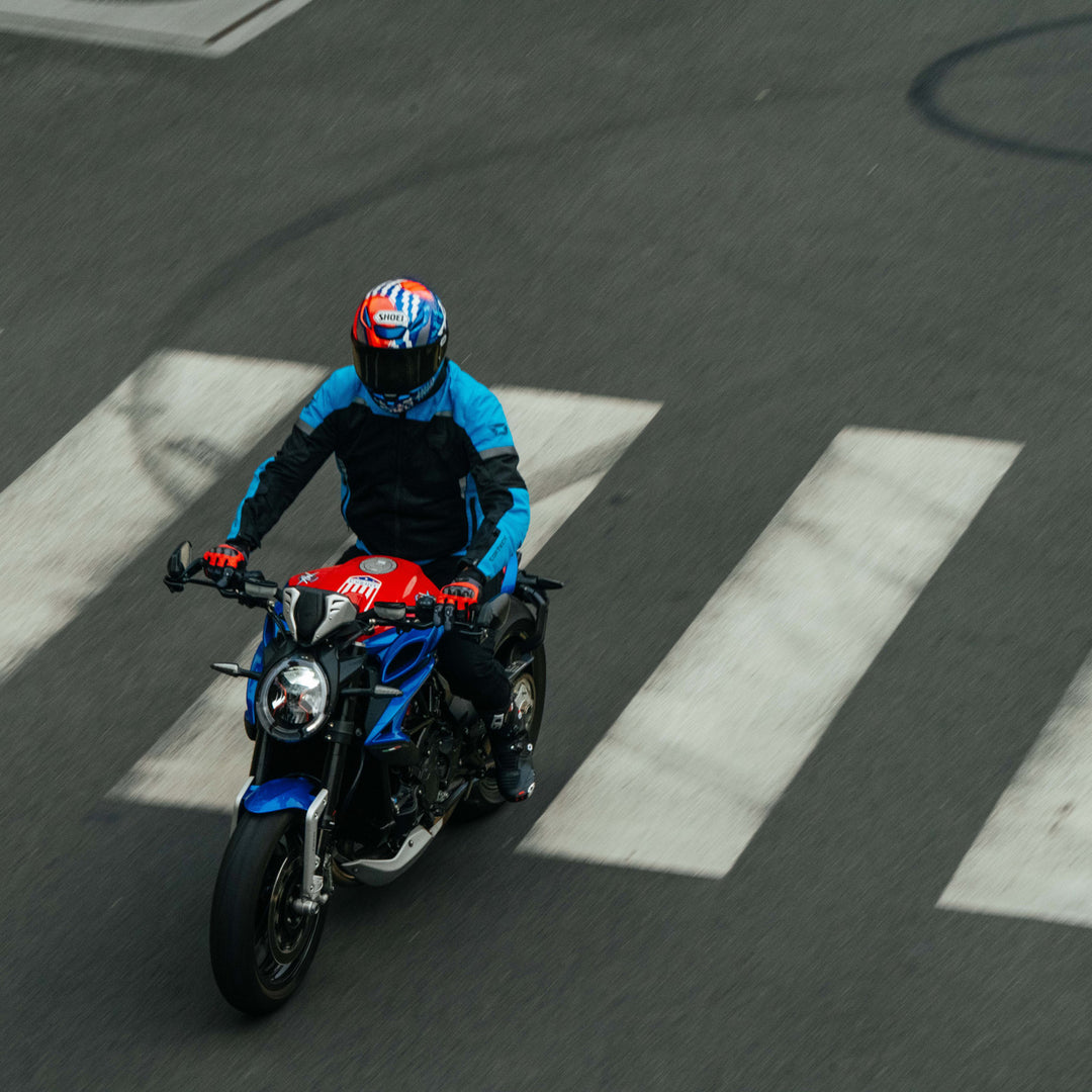 Cortech Apex Air Gloves Red - Lifestyle Overhead Shot of Rider on Street Motorcycle While Wearing Gloves