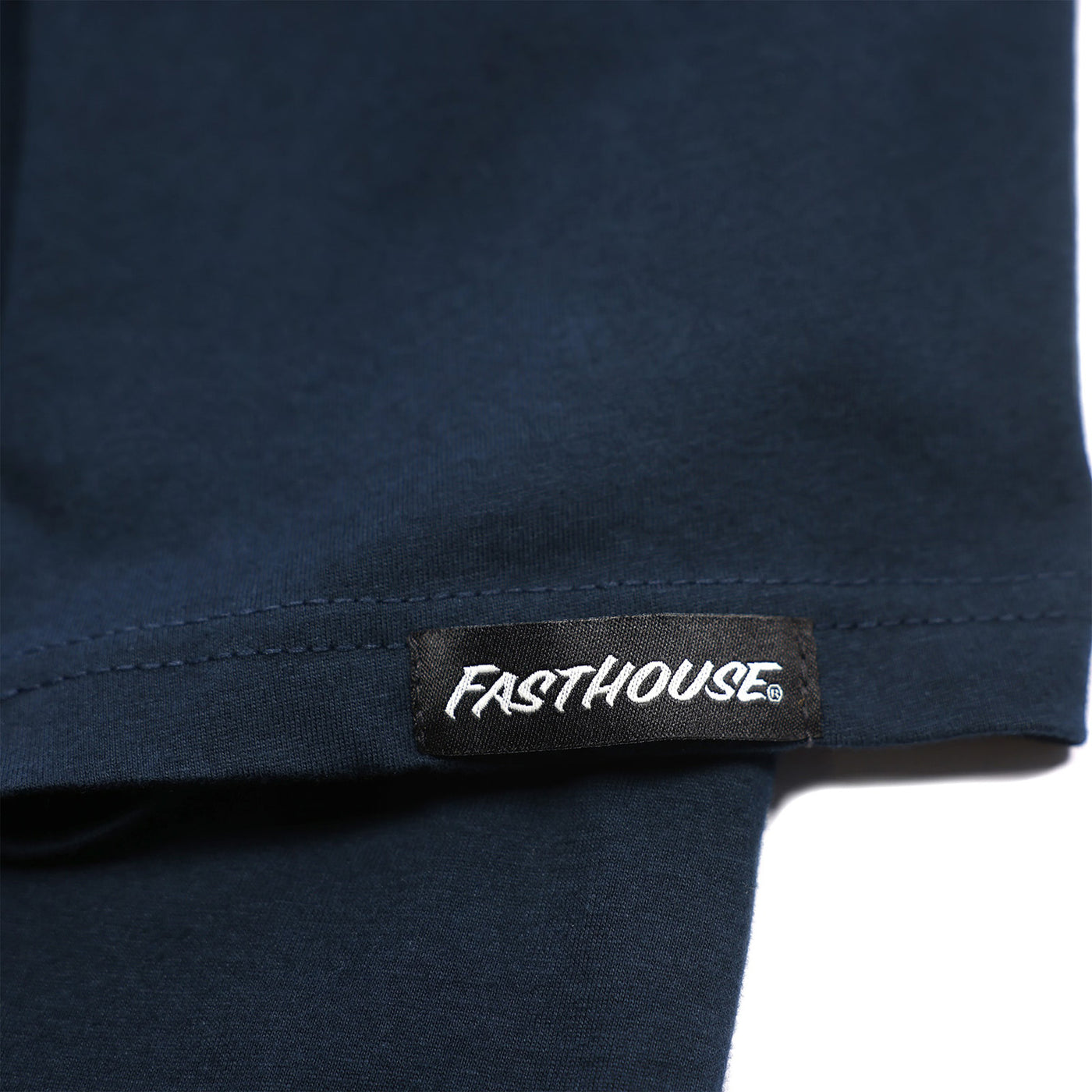 Fasthouse 68 Trick Tee Navy - Close-Up of Logo Sewn into Hem