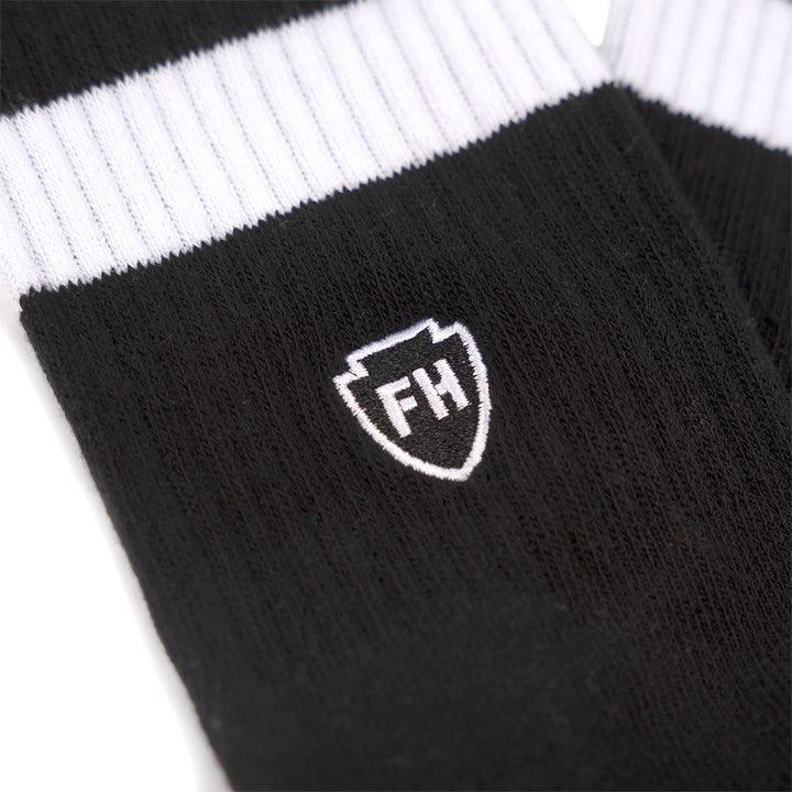 Fasthouse 805 Proper Sock Black - Close-Up of FH Logo