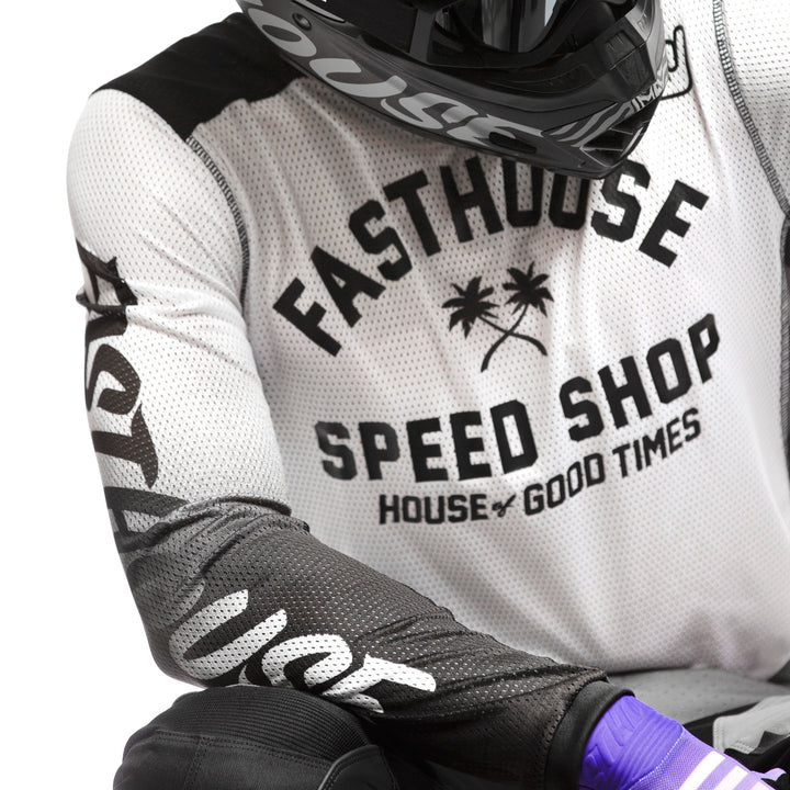Fasthouse A/C Grindhouse Asher Jersey White/Black - Front Side View of Model Leaning on Elbow