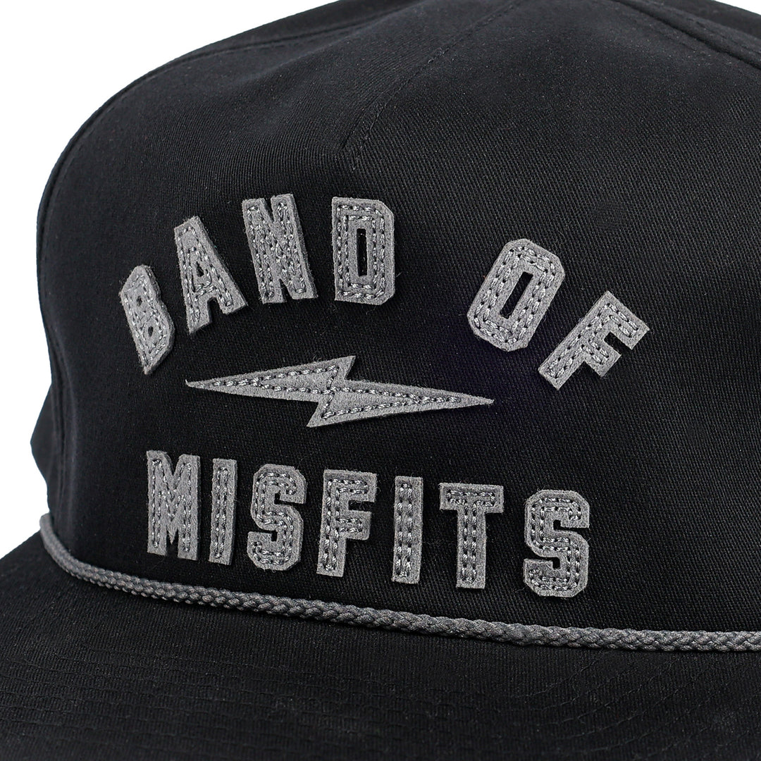 Fasthouse Capone Hat Black - Close-Up of Front Graphic Patches that Spell Out "Band of Misfits"