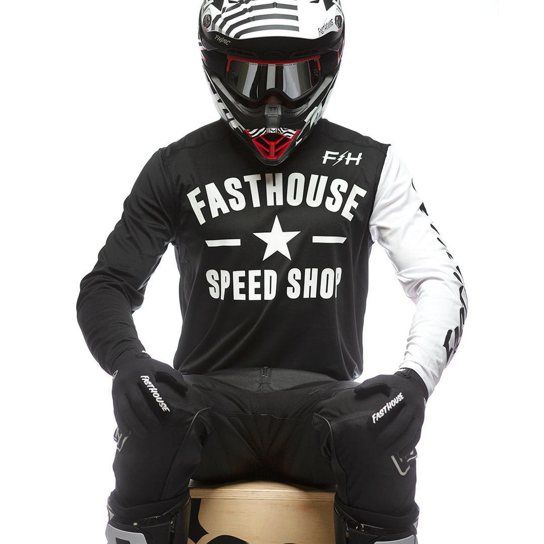 Fasthouse Carbon Jersey Black/White - Shot of Model in jersey sitting