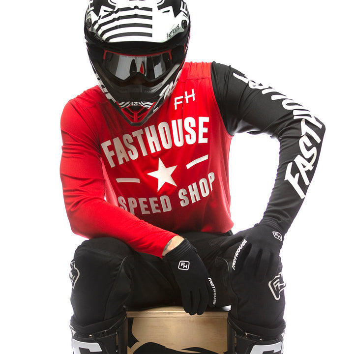 Fasthouse Carbon Jersey Red - Shot of Model in jersey sitting