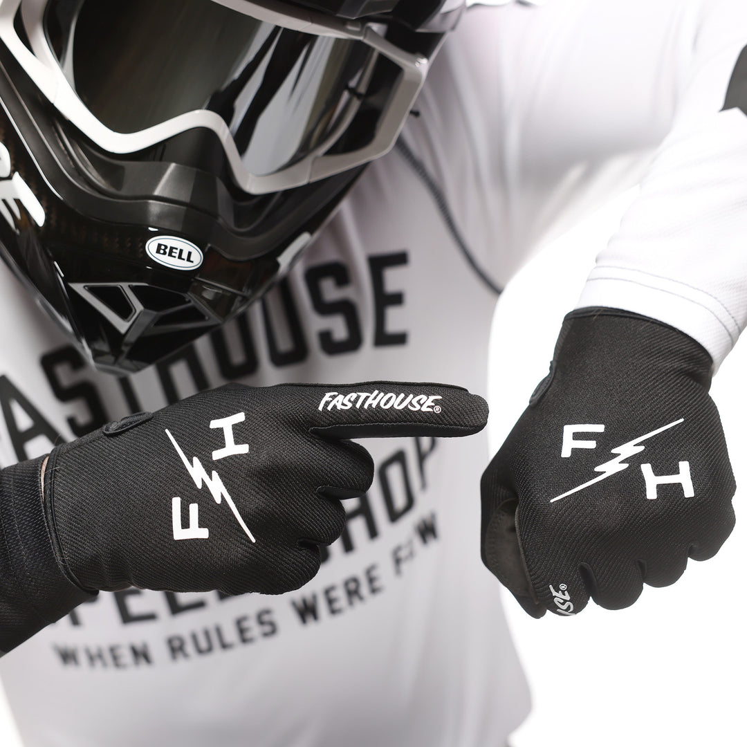Fasthouse Carbon Eternal Gloves Black - Close-Up of Model wearing gloves, pointing one finger at back of other hand