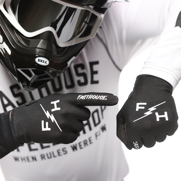Fasthouse Carbon Eternal Gloves Black - Close-Up of Model wearing gloves, pointing one finger at back of other hand