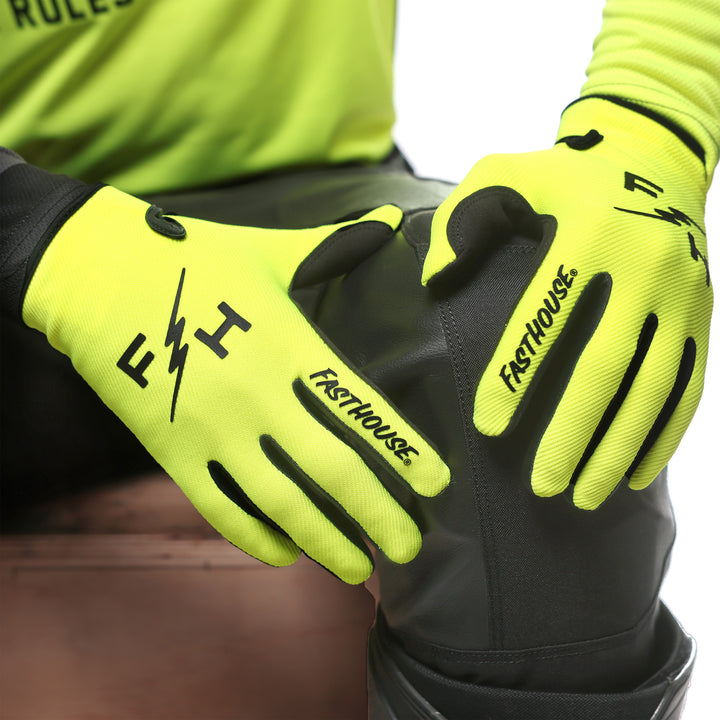 Fasthouse Carbon Eternal Gloves High-Viz - Close-up of Model posing with gloved hands on knee