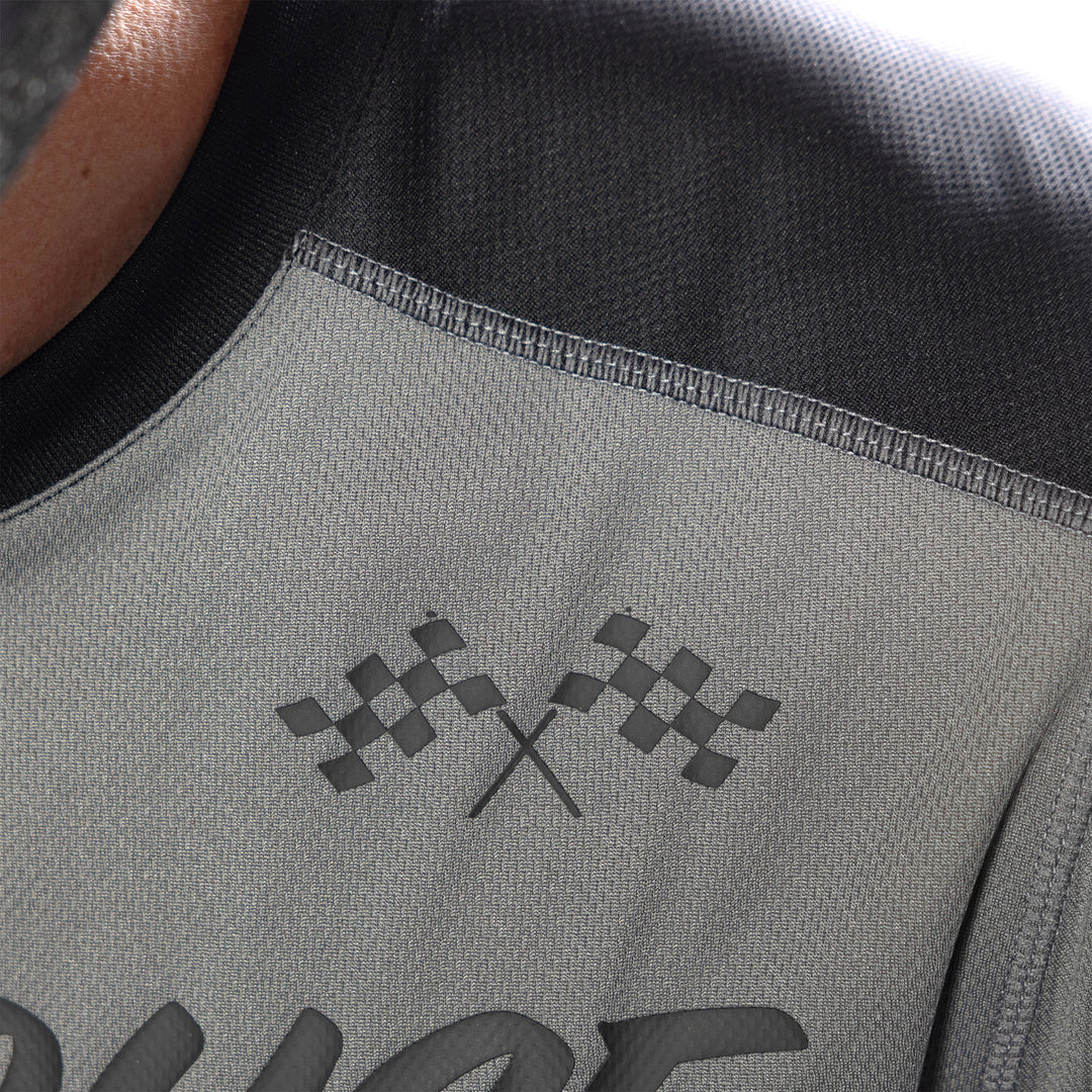 Fasthouse Carbon Method Jersey Gray/Black - Close-Up of Front Left Shoulder Graphics