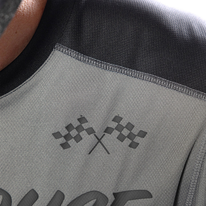 Fasthouse Carbon Method Jersey Gray/Black - Close-Up of Front Left Shoulder Graphics