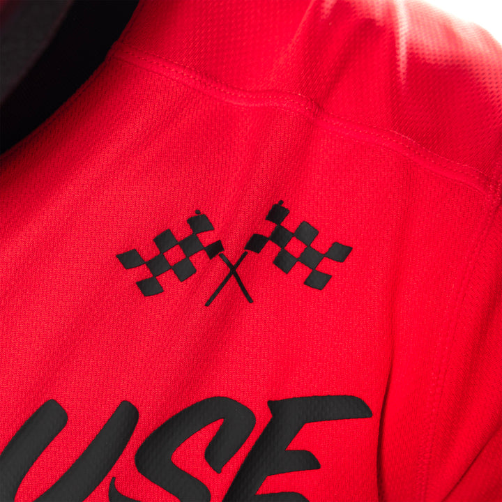Fasthouse Carbon Method Jersey Red/Black - Close-Up of Front Left Shoulder Graphics
