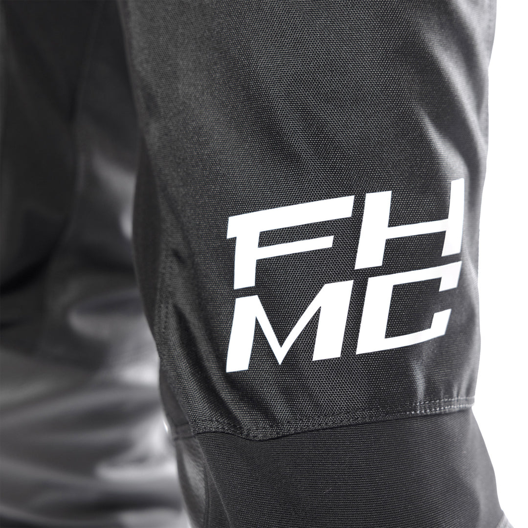 Fasthouse Carbon Method Pants Black - Close-Up of Lower Left Thigh Graphics