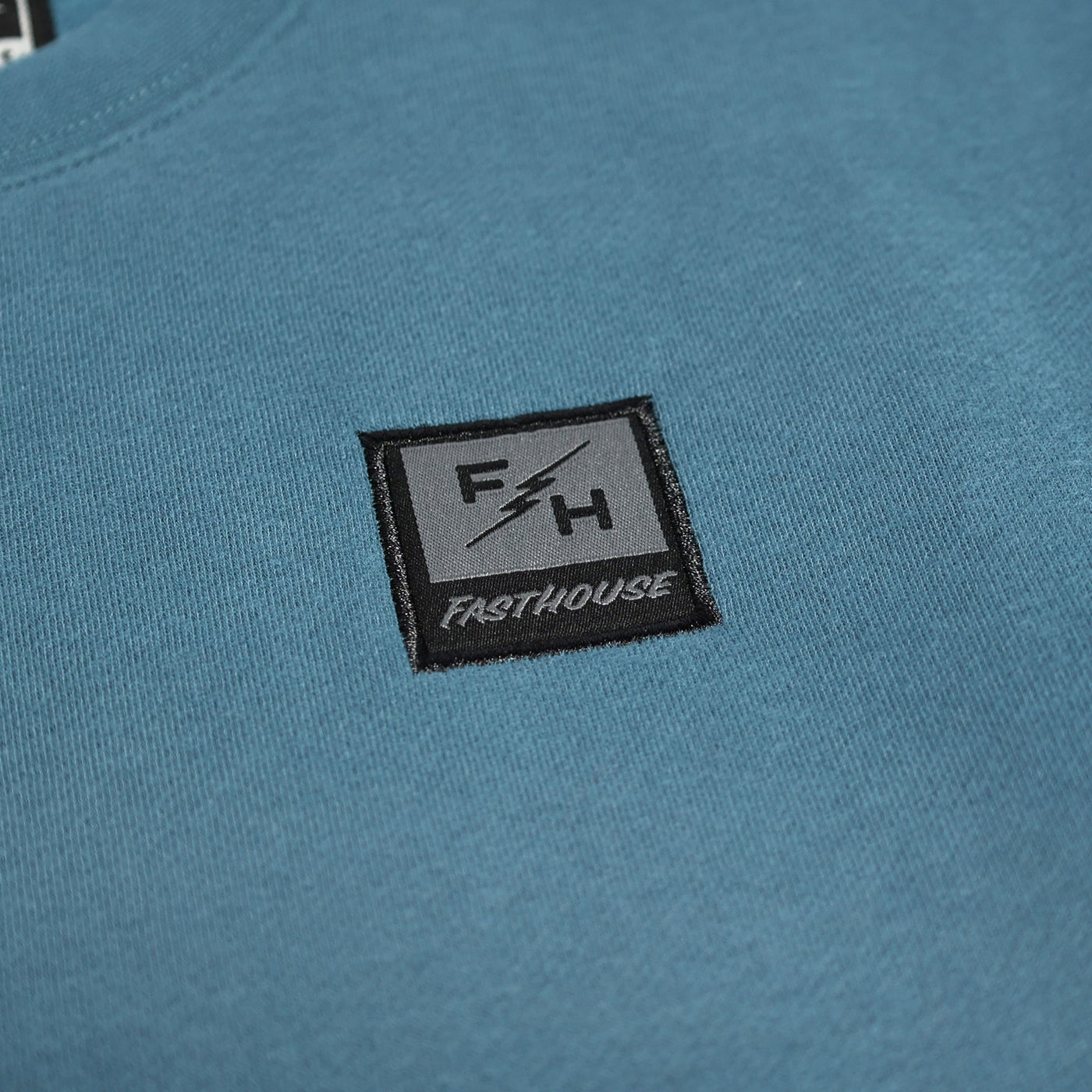 Fasthouse Dash Crew Neck Pullover Vintage Blue - Close-Up of Front Logo