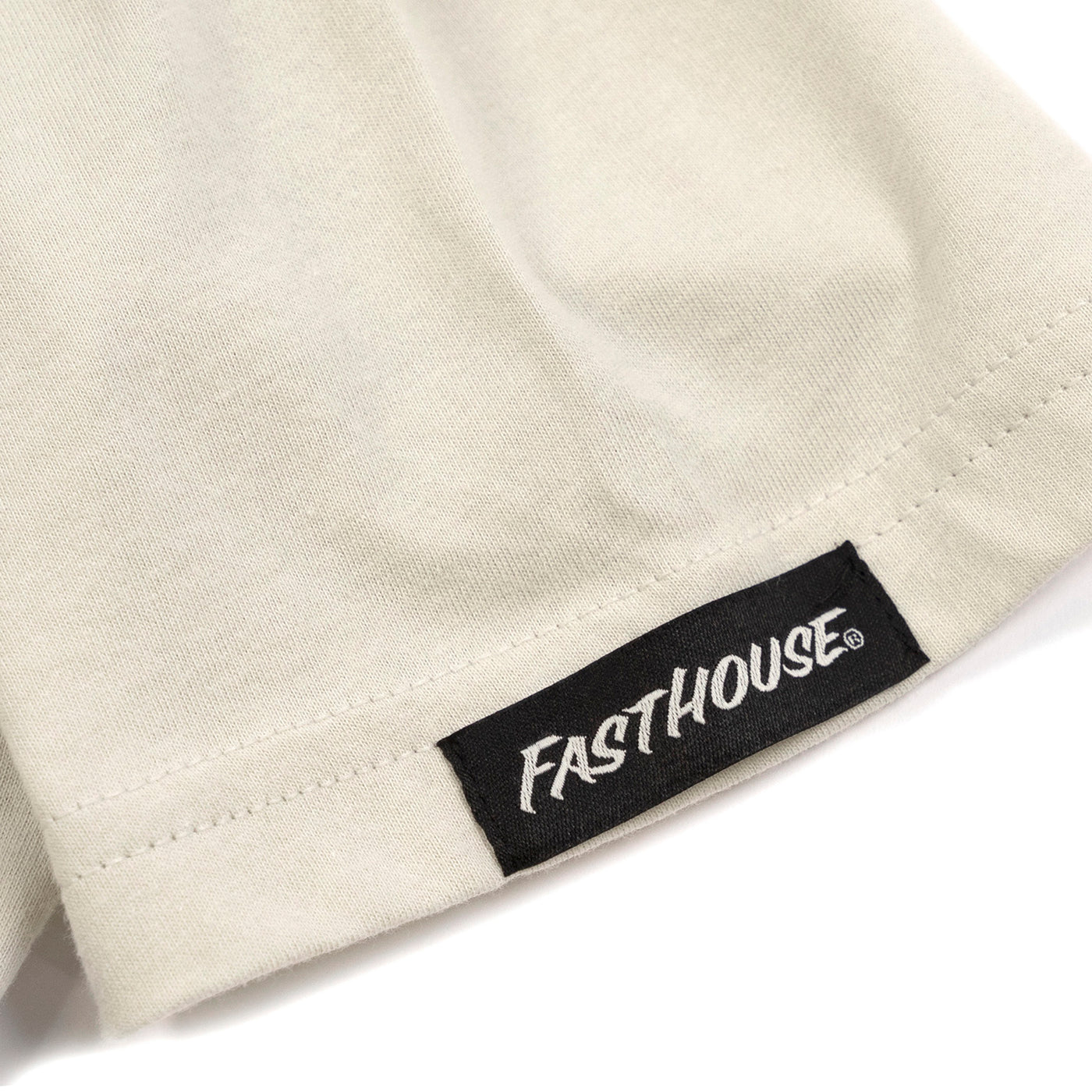 Fasthouse Dust Devil Tee Sand - Close-Up of Tag Sewn into Sleeve Hem