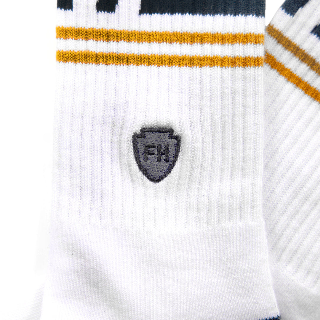 Fasthouse Dozer Crew Socks White - Close-Up Side View of Stitched Logo