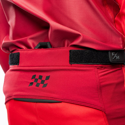 Fasthouse Elrod Ether Pants Red/Jester Red - Close-Up of Right Side Waist Graphic