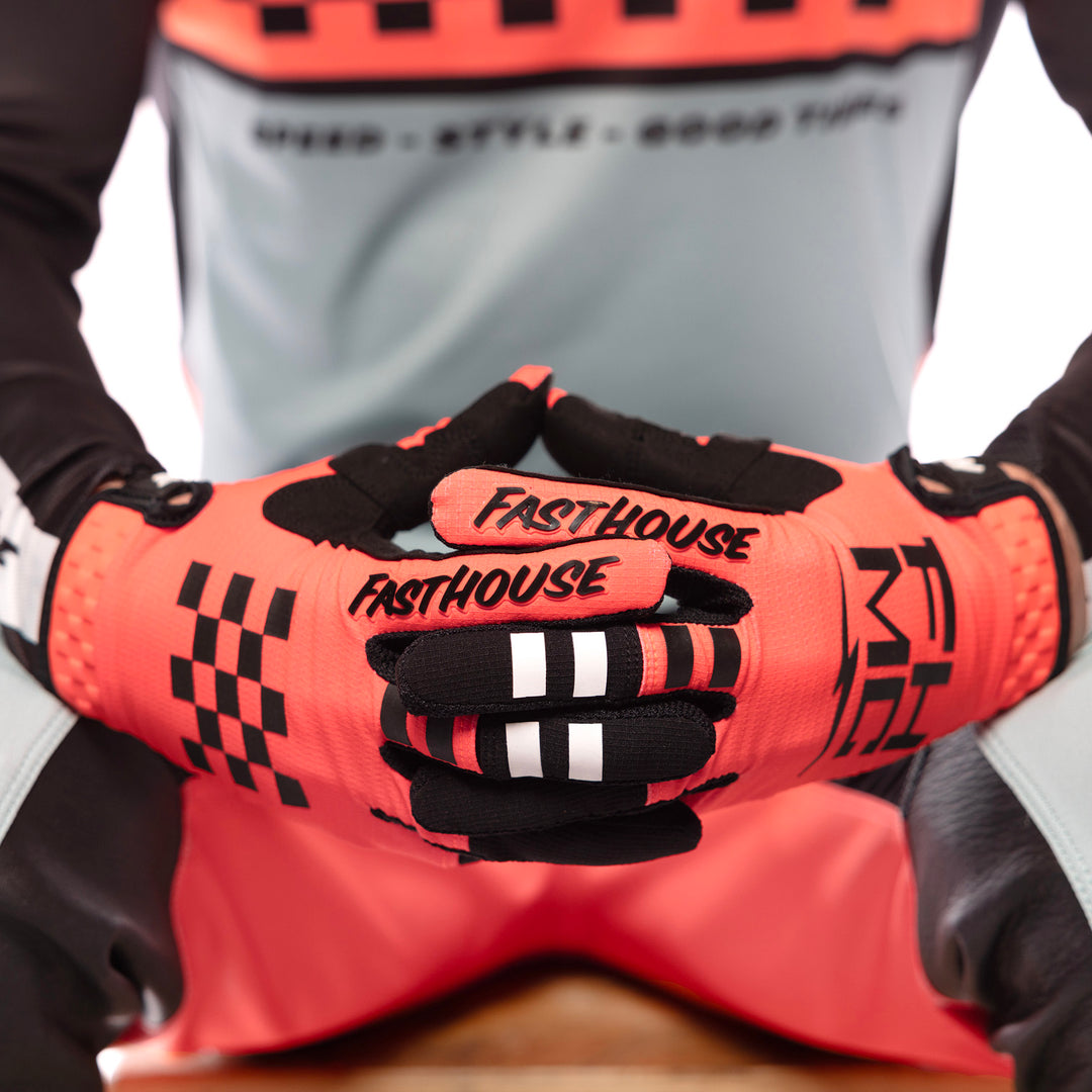 Fasthouse Elrod Formula Gloves Hyper Coral - Close-Up of Model Wearing Gloves, Fingers Entwined