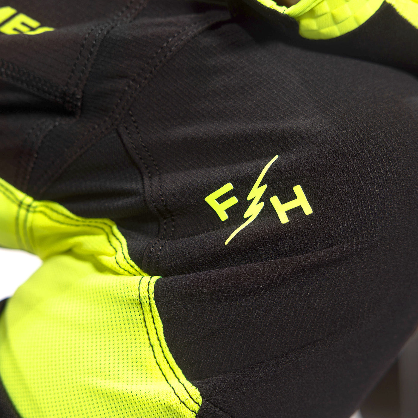 Fasthouse Elrod Hypersonic Pant Hi-Viz - Close-Up of Knee Graphic