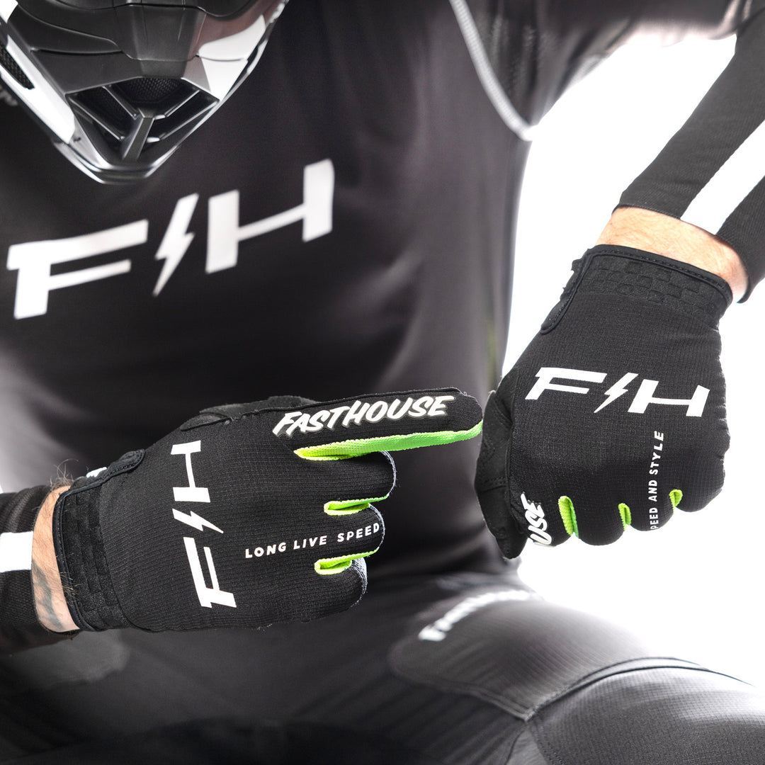 Fasthouse Elrod Nitro Gloves Black Neon - Close-Up of Model Wearing Gloves, Right Hand Pointing at Back of Left Hand