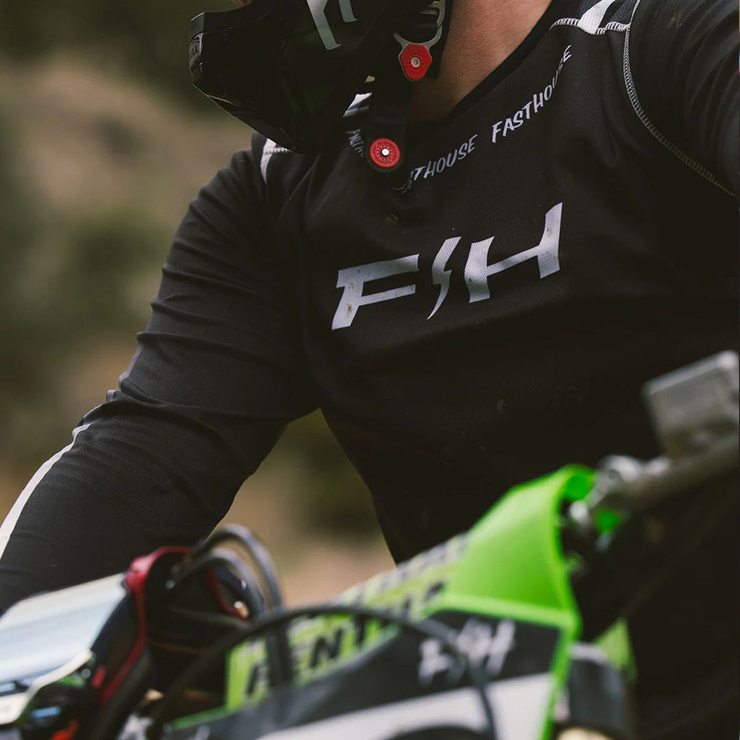 Fasthouse Elrod Nitro Jersey Black Neon - Lifestyle Angled Close-Up of Front Graphics