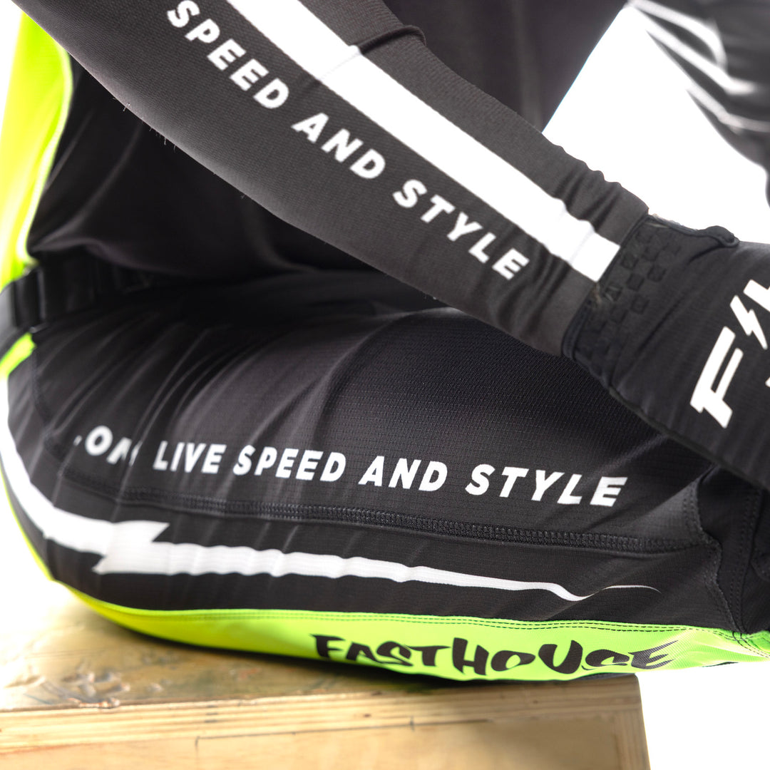 Fasthouse Elrod Nitro Pants Black Neon - Close-up of Right Thigh Graphics