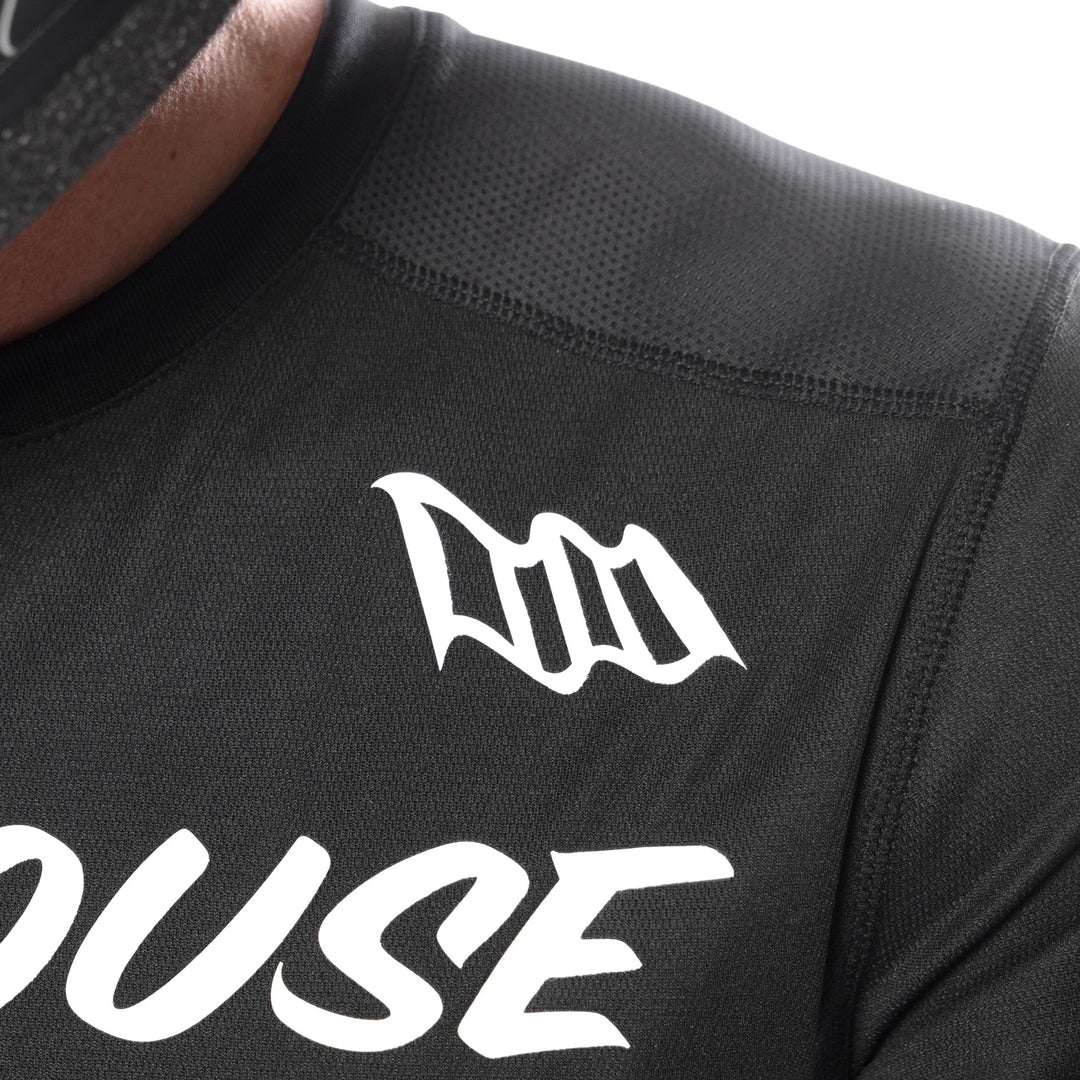 Fasthouse Elrod Torque Jersey Black - Close-Up of Front Left Shoulder Graphics