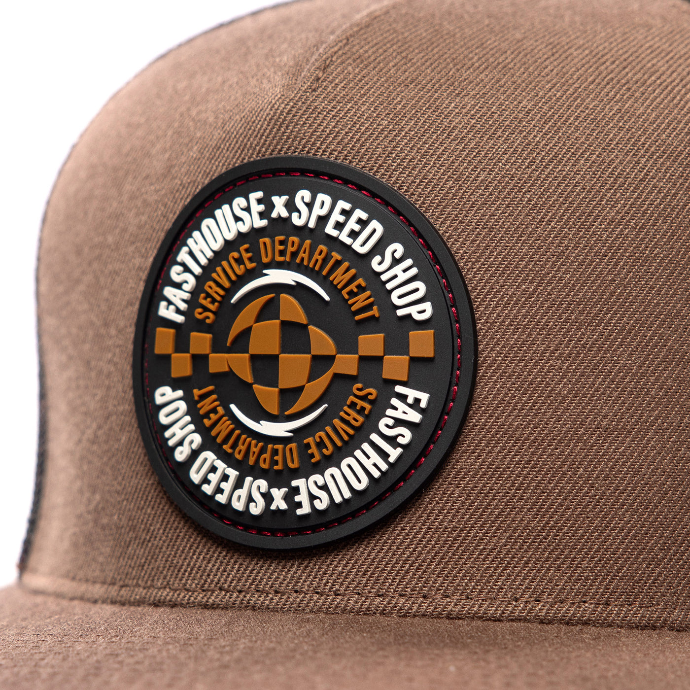 Fasthouse Finch Hat Teak - Close-Up of Front Rubber Patch
