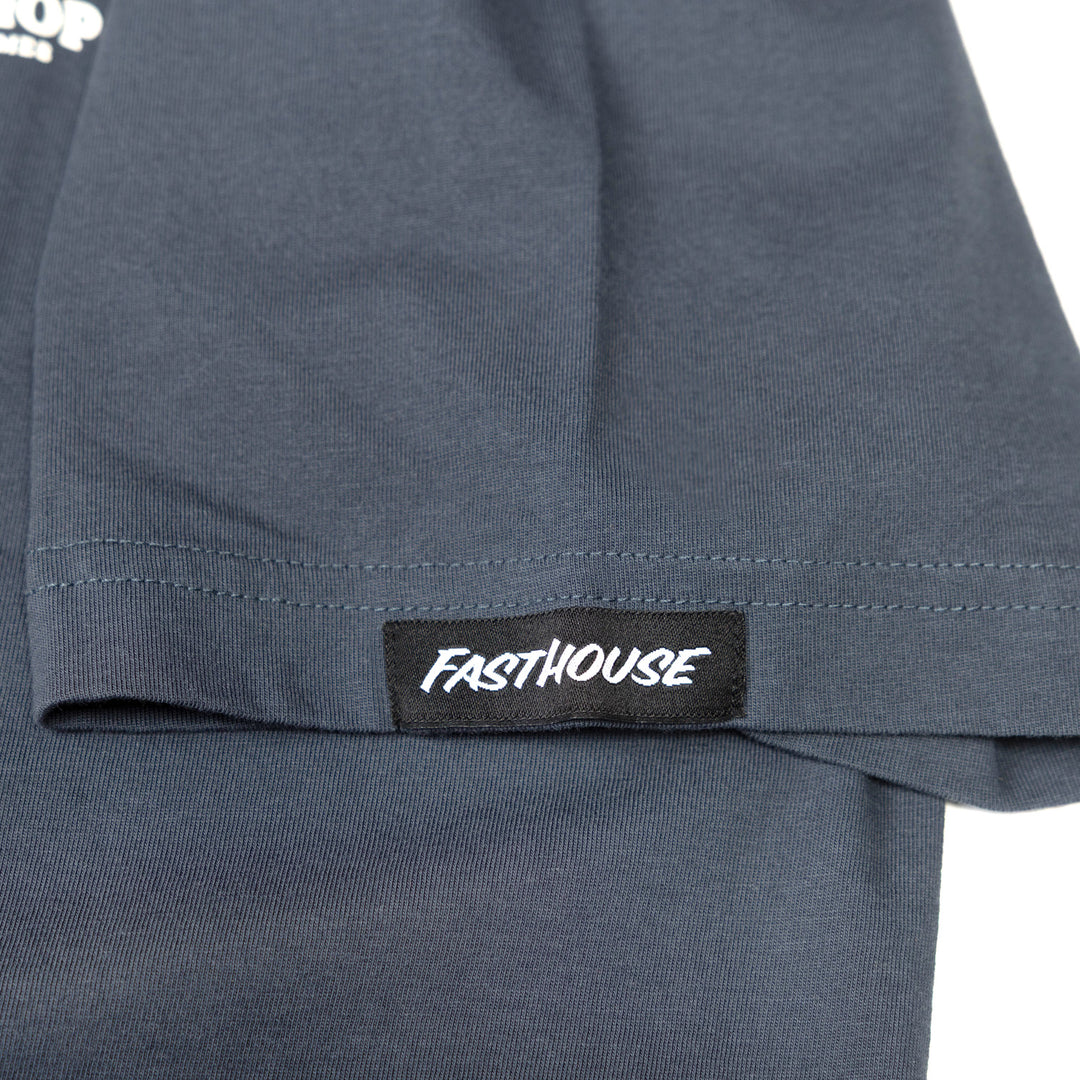Fasthouse Getaway SS Tee Indigo - Close-Up of Logo Tag Sewn on Sleeve
