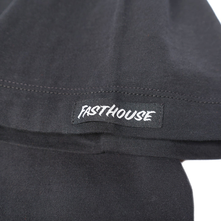 Fasthouse Gibson SS Tee Graphite Black - Close-Up of Logo Tag Sewn into Sleeve