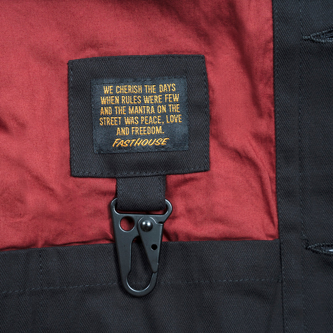 Fasthouse Grafter Chore Coat Black - Close-Up of Interior Label with Hanging Carabiner