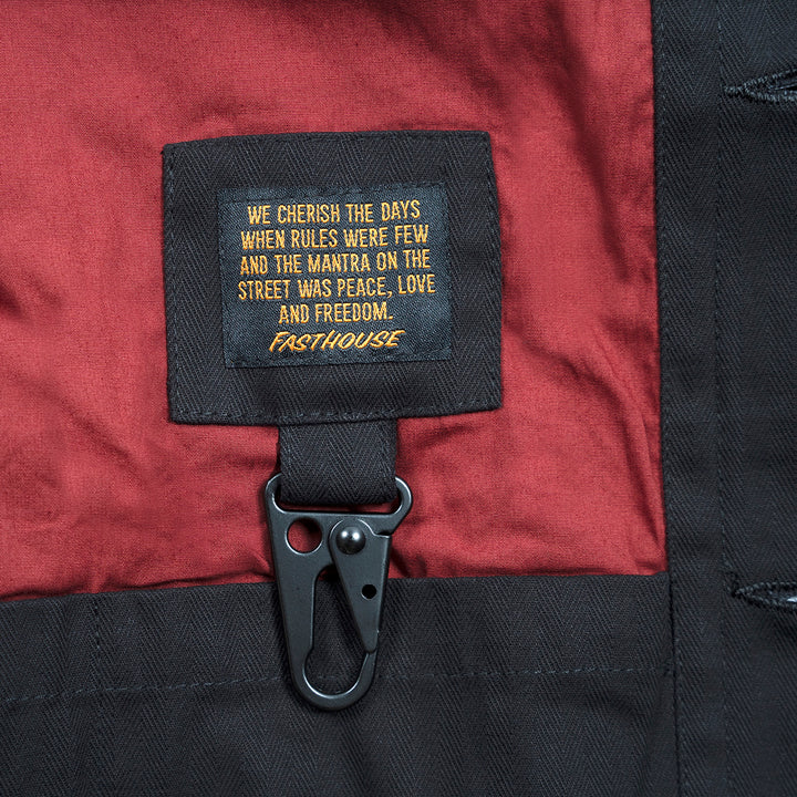 Fasthouse Grafter Chore Coat Black - Close-Up of Interior Label with Hanging Carabiner