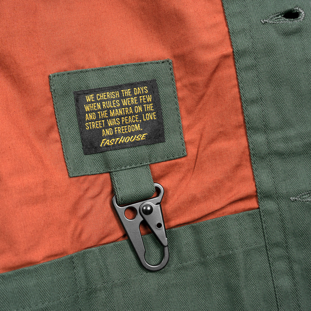 Fasthouse Grafter Chore Coat Thyme - Close-up of Interior Label with Hanging Carabiner