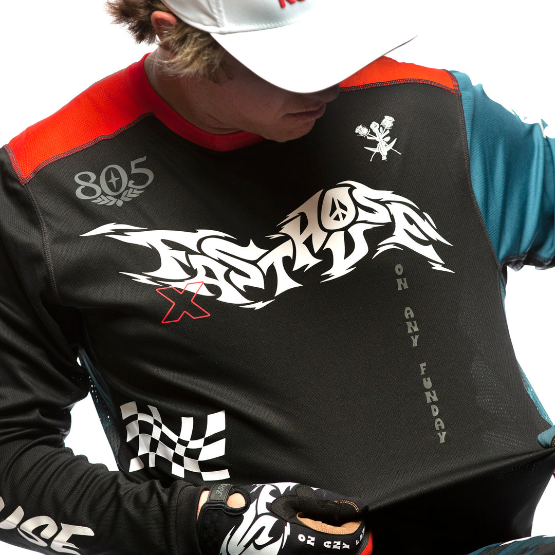 Fasthouse Grindhouse Bereman Jersey Black/Infrared - Front View of Model Showing Chest Graphics