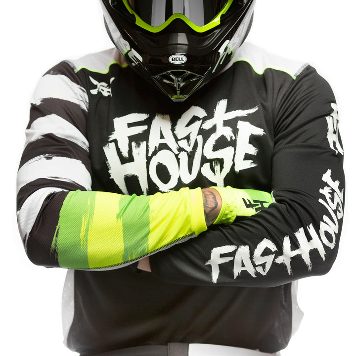 Fasthouse Grindhouse Jester Jersey Black - Front View of Model Wearing Jersey with Arms Crossed Over Chest