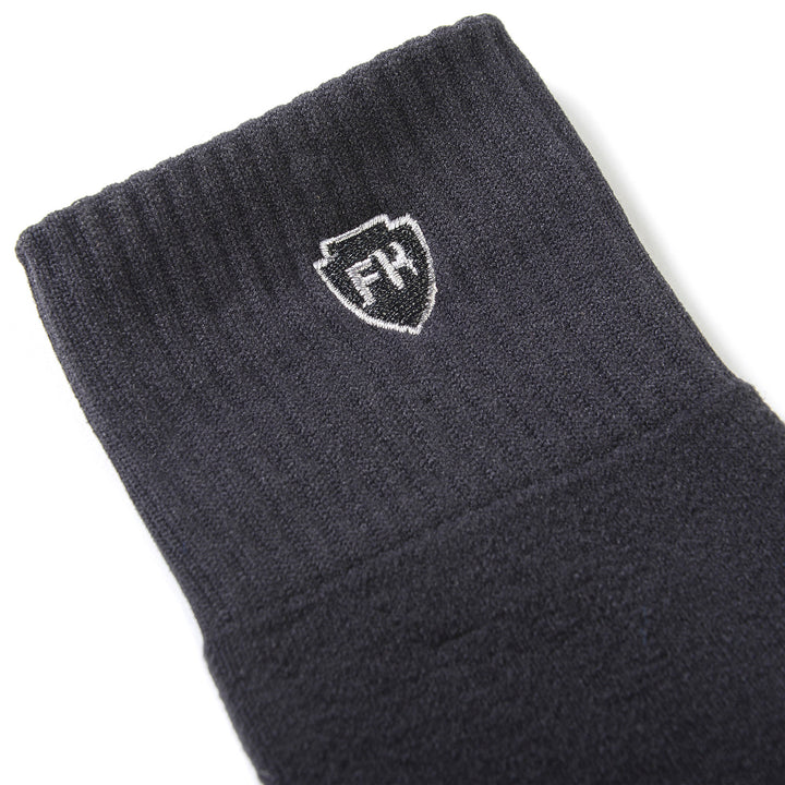 Fasthouse Grindhouse Stealth Moto Sock Black - Close-Up of Logo on Top Band