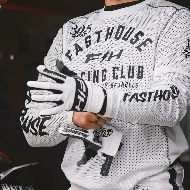 Fasthouse Grindhouse Air-Cooled Club Jersey White/Cloud - Lifestyle Close-Up of Rider Wearing Jersey