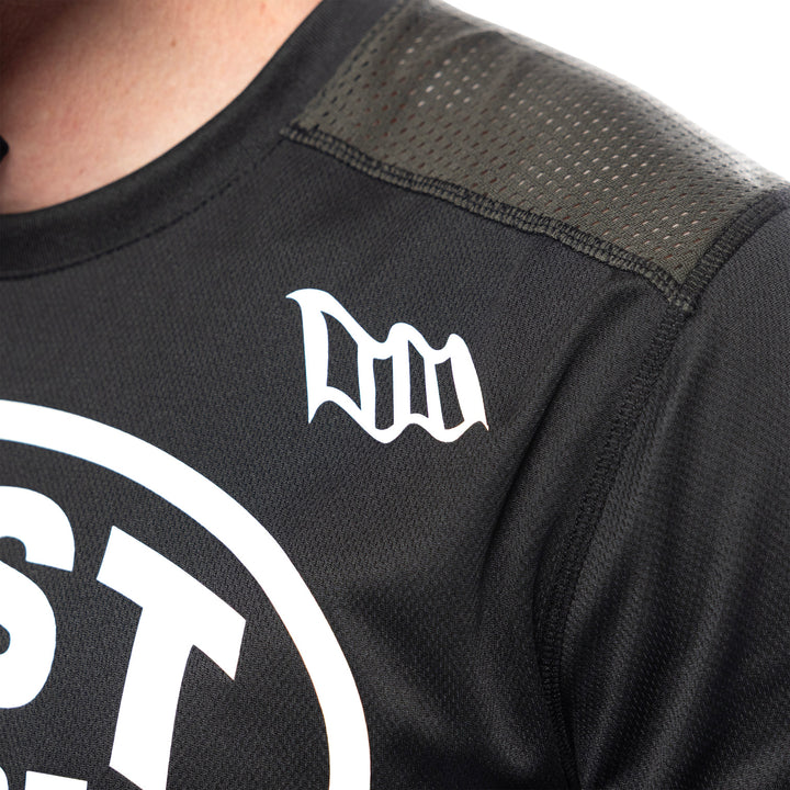 Fasthouse Grindhouse Air-Cooled Ramble Jersey Black/Gray - Close-Up of Left Shoulder Graphics