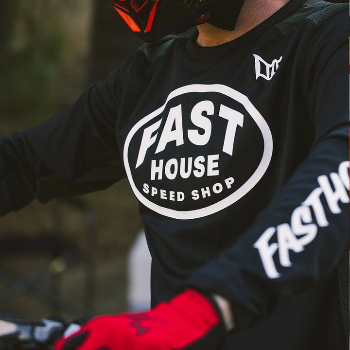 Fasthouse Grindhouse Air-Cooled Ramble Jersey Black/Gray - Lifestyle Close-Up of Front Graphics