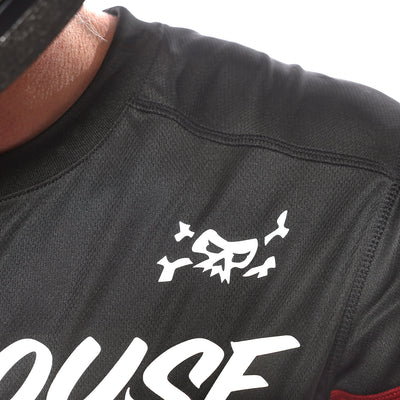 Fasthouse Grindhouse Akin Jersey Red/Black - Close-Up of Chest Shoulder Graphic