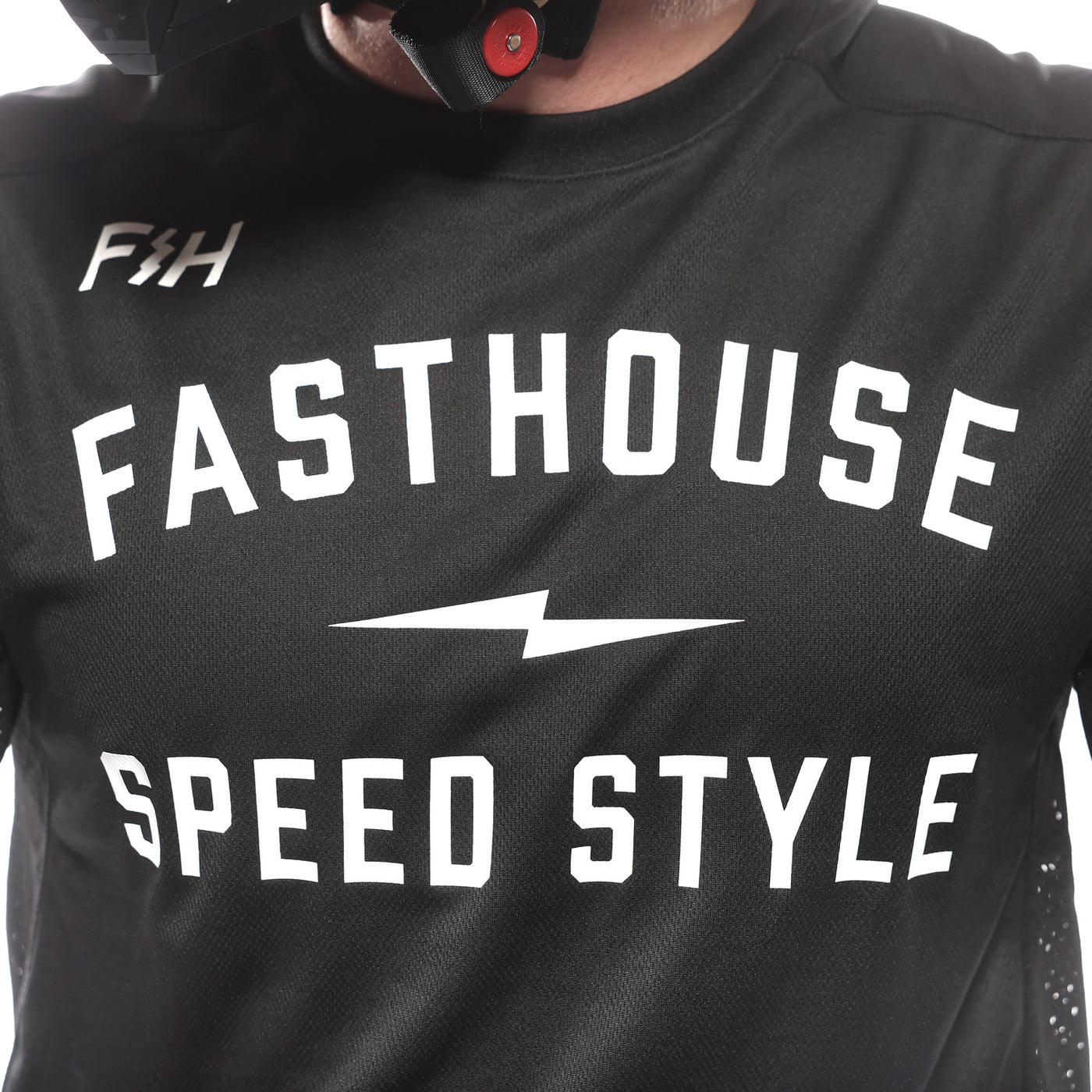 Fasthouse Grindhouse Grit Jersey Black - Close-Up of Chest Graphic